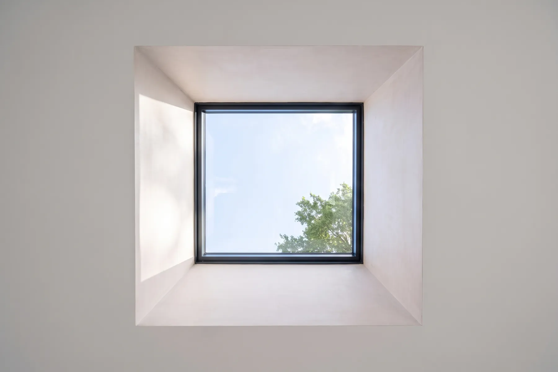 A rooflight in the NuaHome Warm Roof, seen from the room below